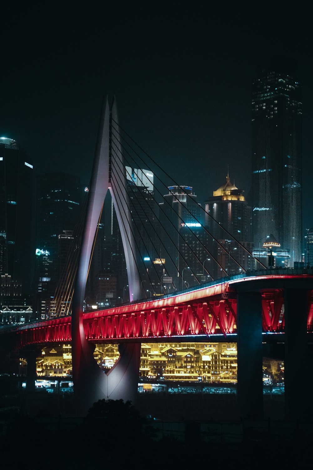 Red bridge over body of water during night time photo – Free Chongqing  Image on Unsplash