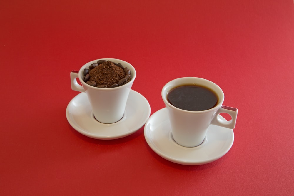 white ceramic cup on white ceramic saucer