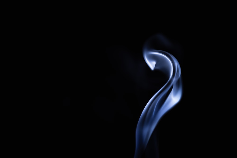 white smoke in black background