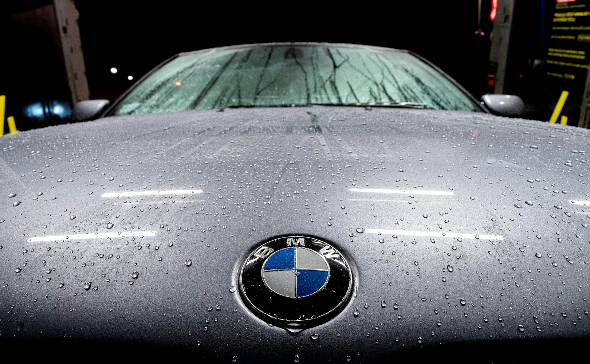 black bmw car with yellow and green light