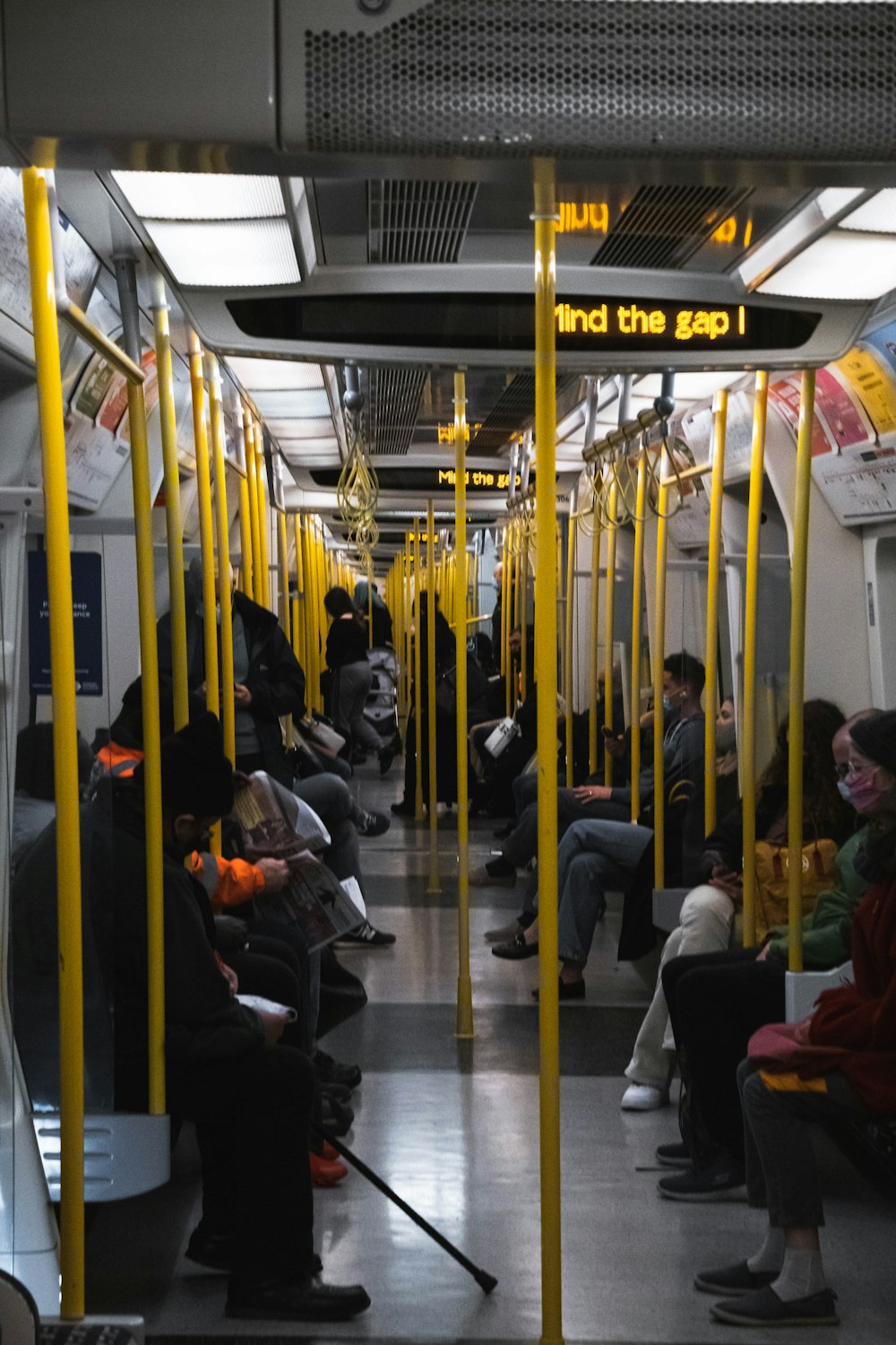 people sitting on train seat