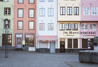 white and brown concrete building during daytime