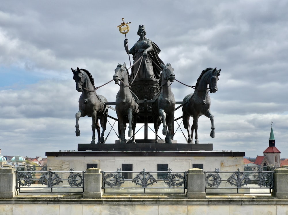 man riding horse statue during daytime