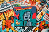 a bunch of comic books laying on top of each other