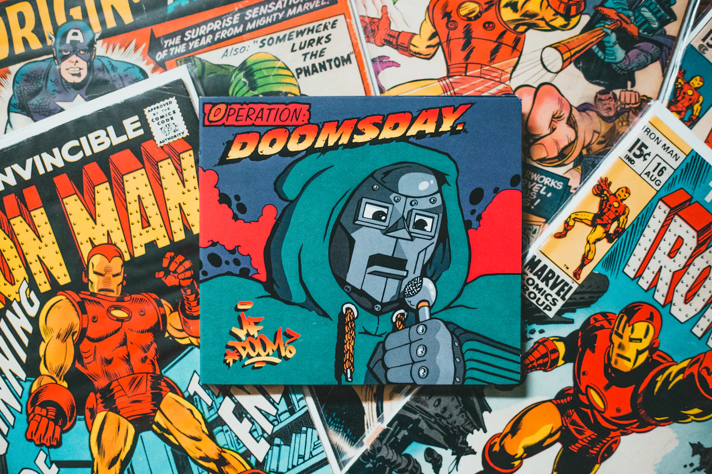 A stack of colour comic books on a wooden table