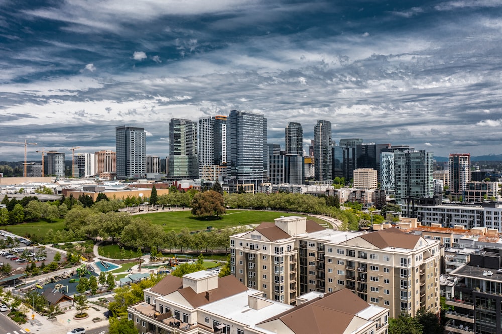 city buildings under cloudy sky during daytime