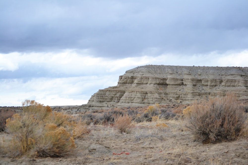 brown rocky mountain under white sky during daytime