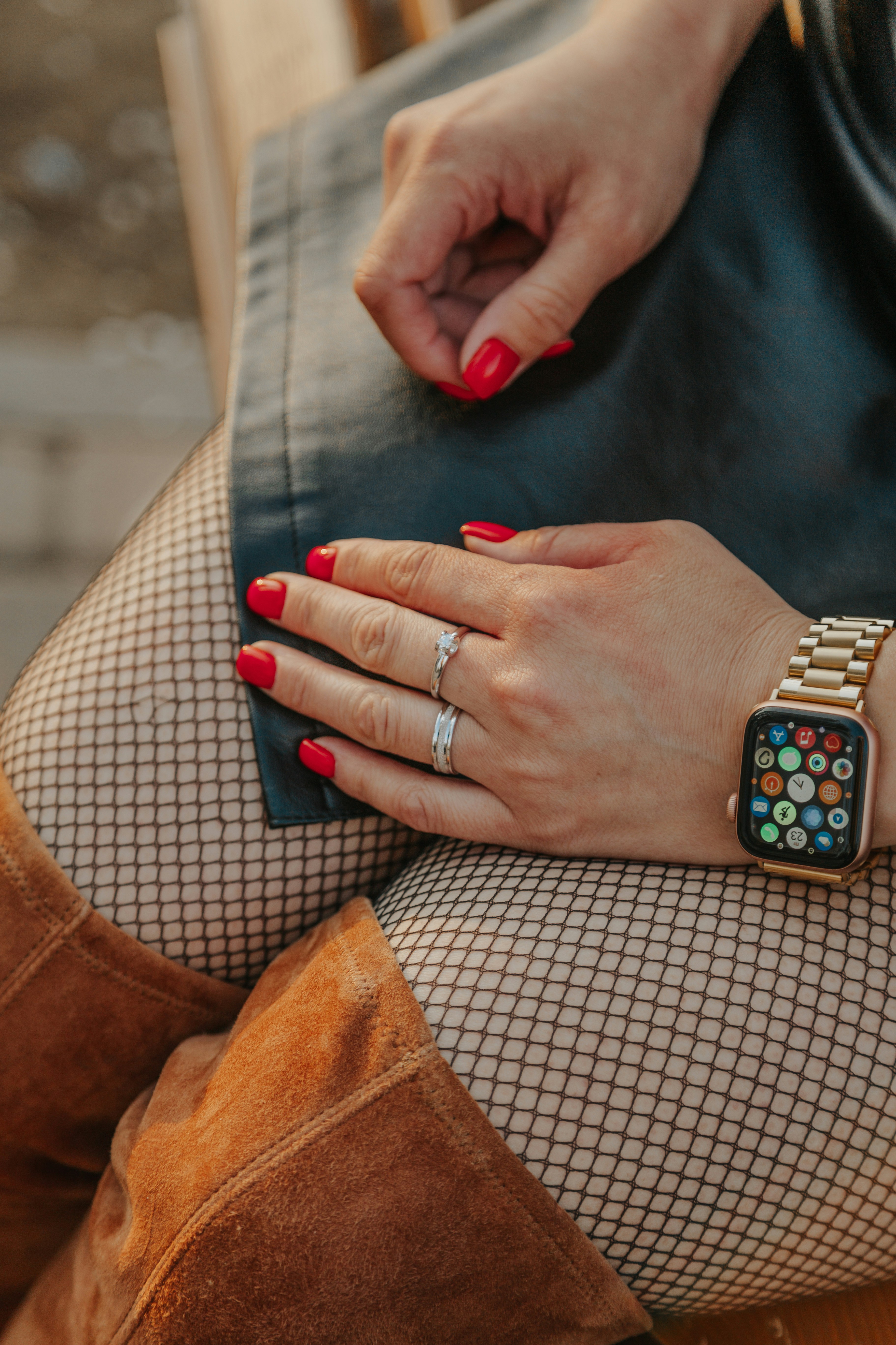 person wearing silver ring and silver ring