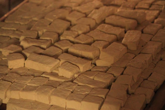 A grid of various sized blocks arranged neatly on a light gray background.