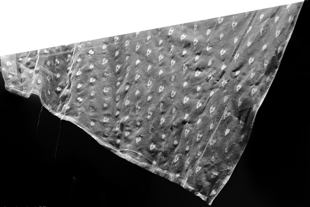 black and white polka dot textile
