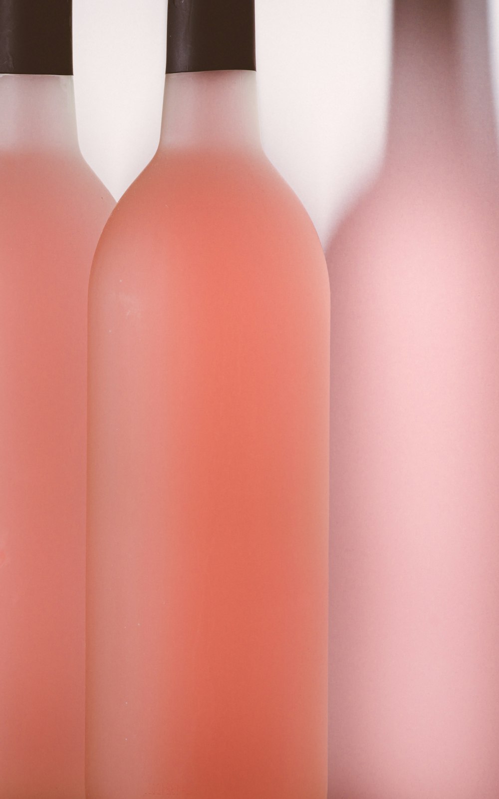 pink and white plastic bottles