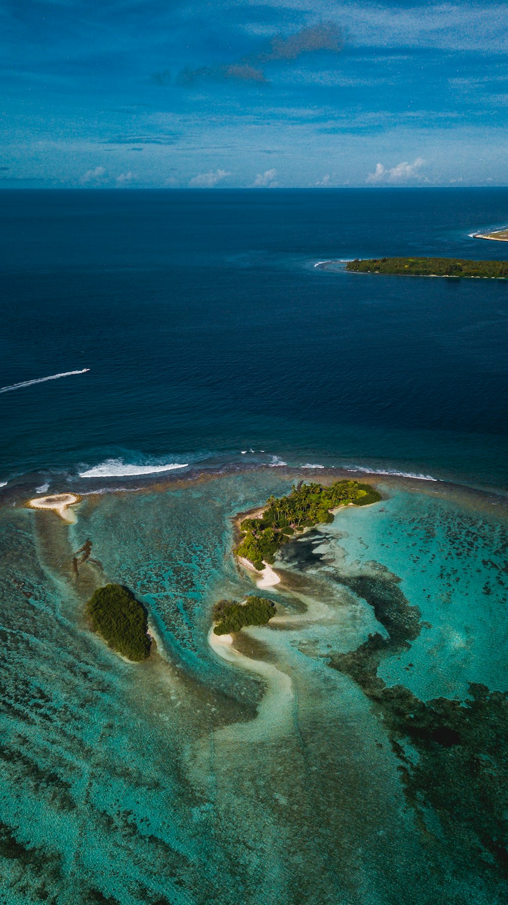 aerial view of green island during daytime