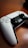 A gaming controller is placed on a wooden surface, featuring a sleek black and white design with prominent joysticks and buttons.
