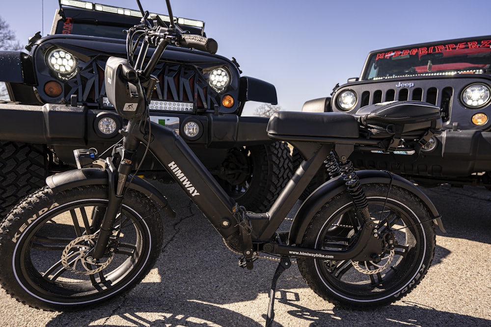 black and blue motorcycle on gray asphalt road during daytime