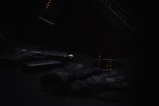 An artistic shot of multiple suppressors arranged in a row.