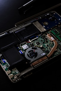 green and black computer hard disk drive