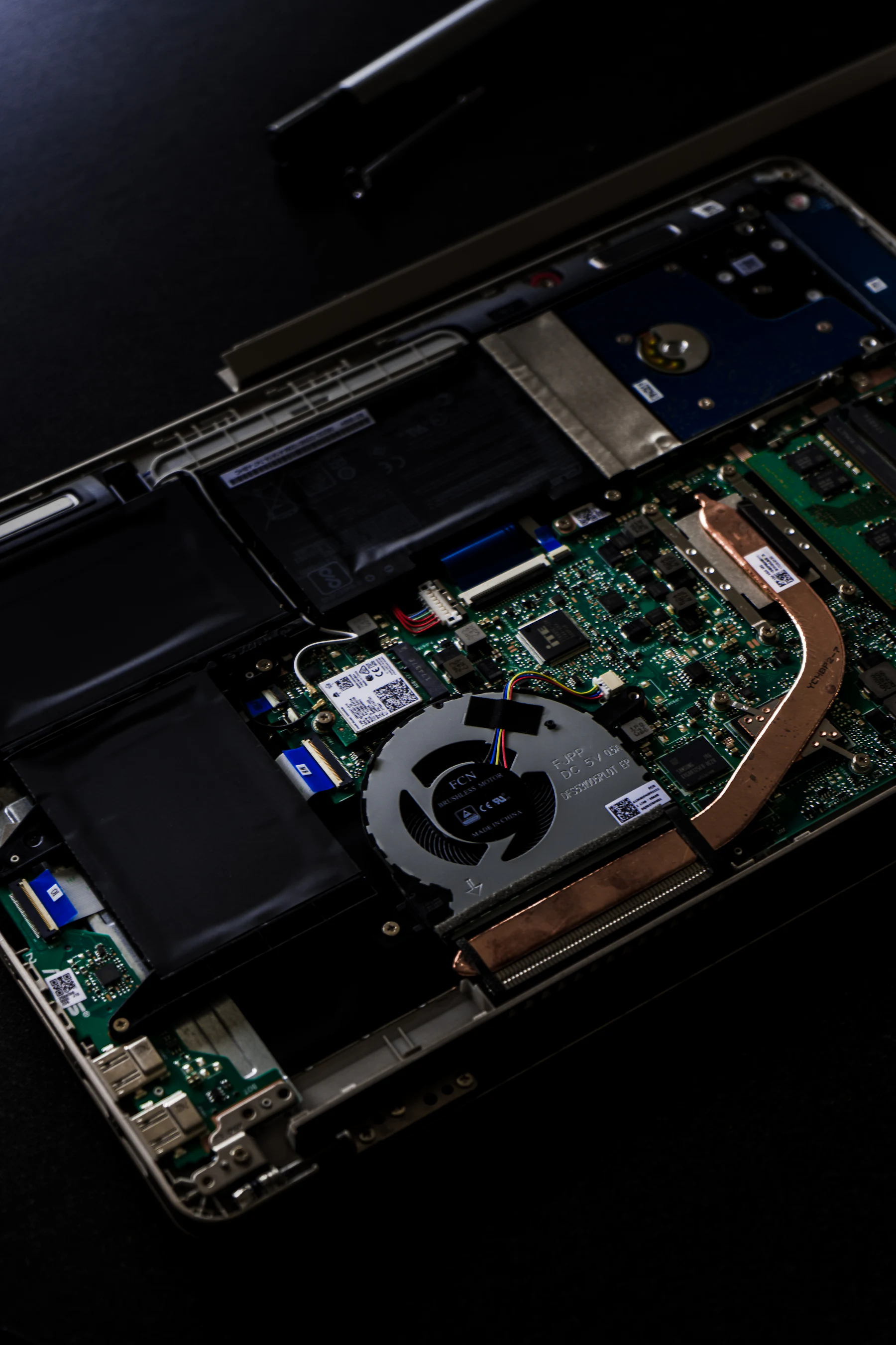 A computer hard disk drive opened up