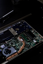 green and black computer hard disk drive