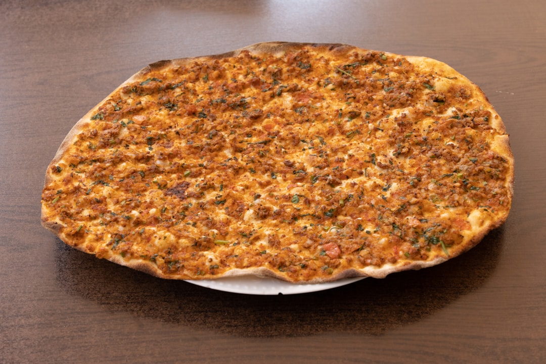 brown and white pizza on white ceramic plate, Traditional baked and fresh Turkish pita
