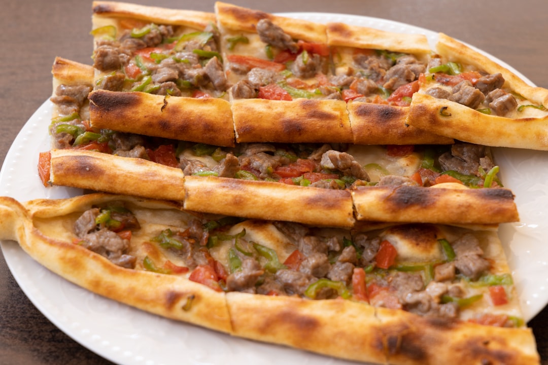 pizza on white ceramic plate, Traditional baked and fresh Turkish pita
