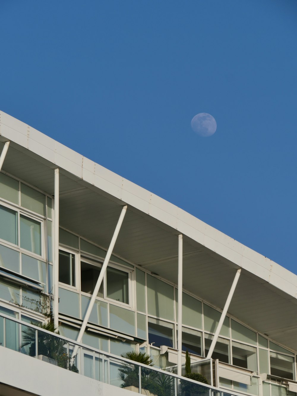 white concrete building under blue sky during daytime