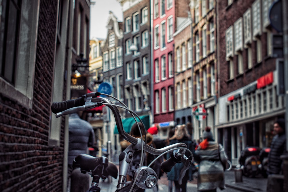 a bicycle parked on the side of a street