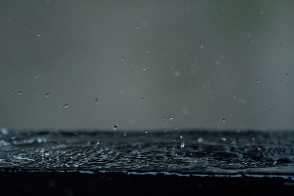 water droplets on black surface