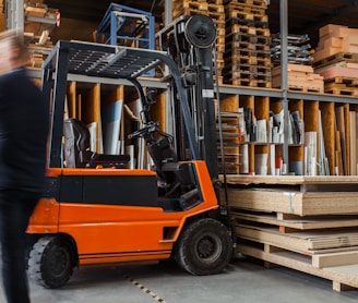 yellow and black fork lift