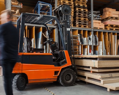 yellow and black fork lift