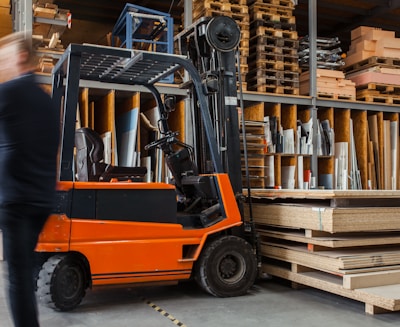 yellow and black fork lift