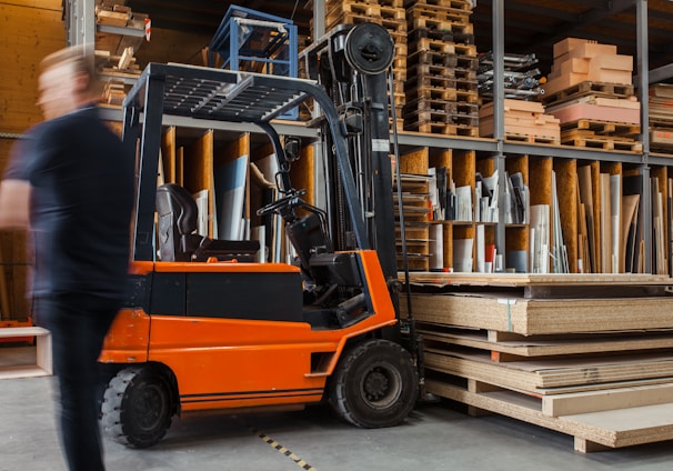 yellow and black fork lift