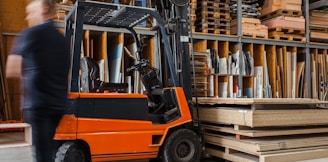 yellow and black fork lift