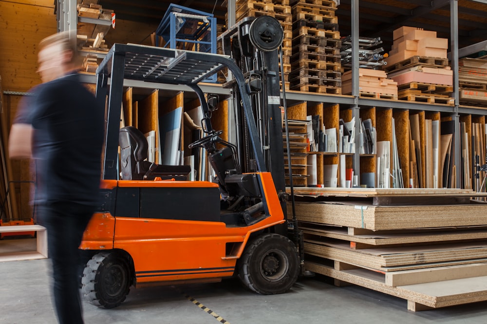 yellow and black fork lift