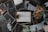 A variety of photographs surround a central image of a clipboard with the word 'Depression' typed on it. The surrounding photos depict individuals in various poses of distress or contemplation, suggesting themes of sadness, loneliness, and introspection.