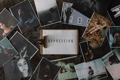 A variety of photographs surround a central image of a clipboard with the word 'Depression' typed on it. The surrounding photos depict individuals in various poses of distress or contemplation, suggesting themes of sadness, loneliness, and introspection.