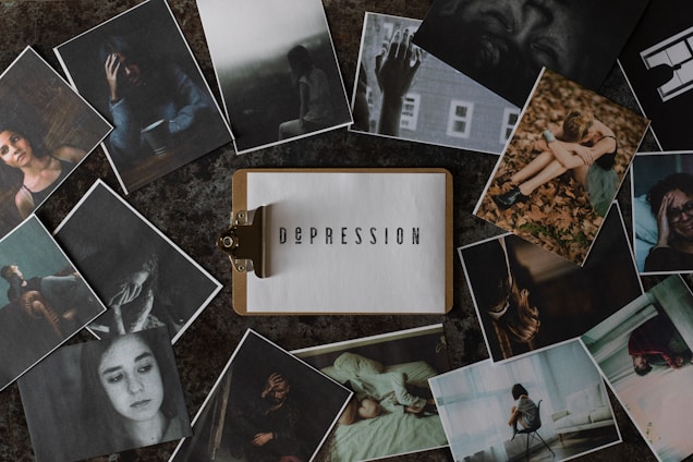 A variety of photographs surround a central image of a clipboard with the word 'Depression' typed on it. The surrounding photos depict individuals in various poses of distress or contemplation, suggesting themes of sadness, loneliness, and introspection.