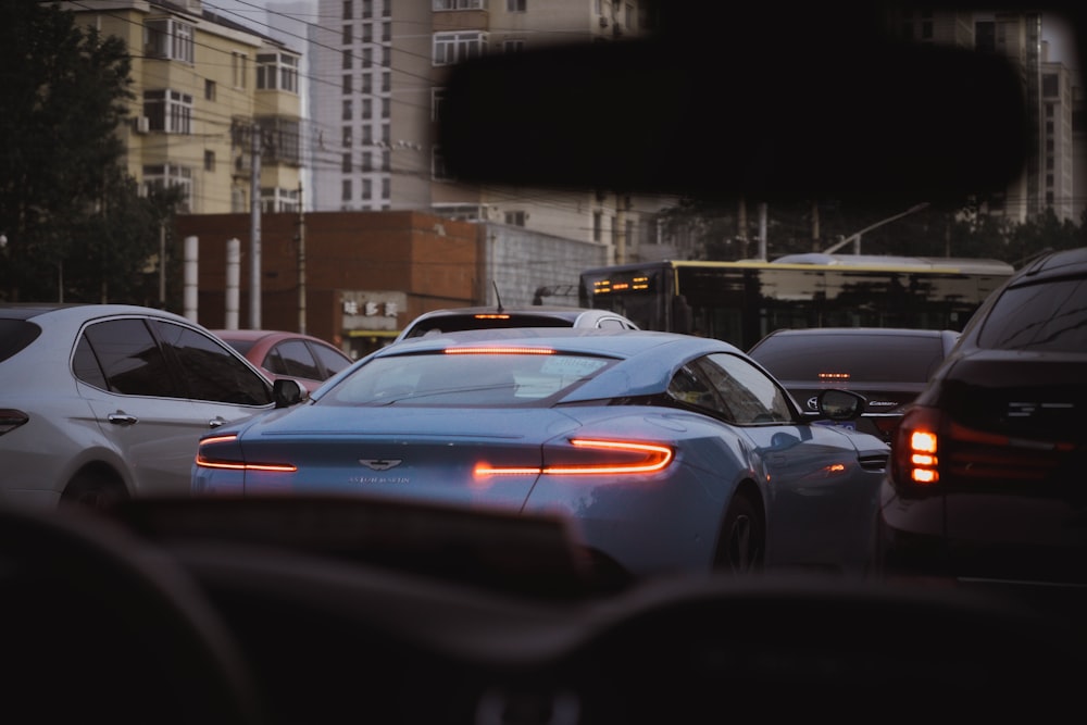 blue car on road during daytime