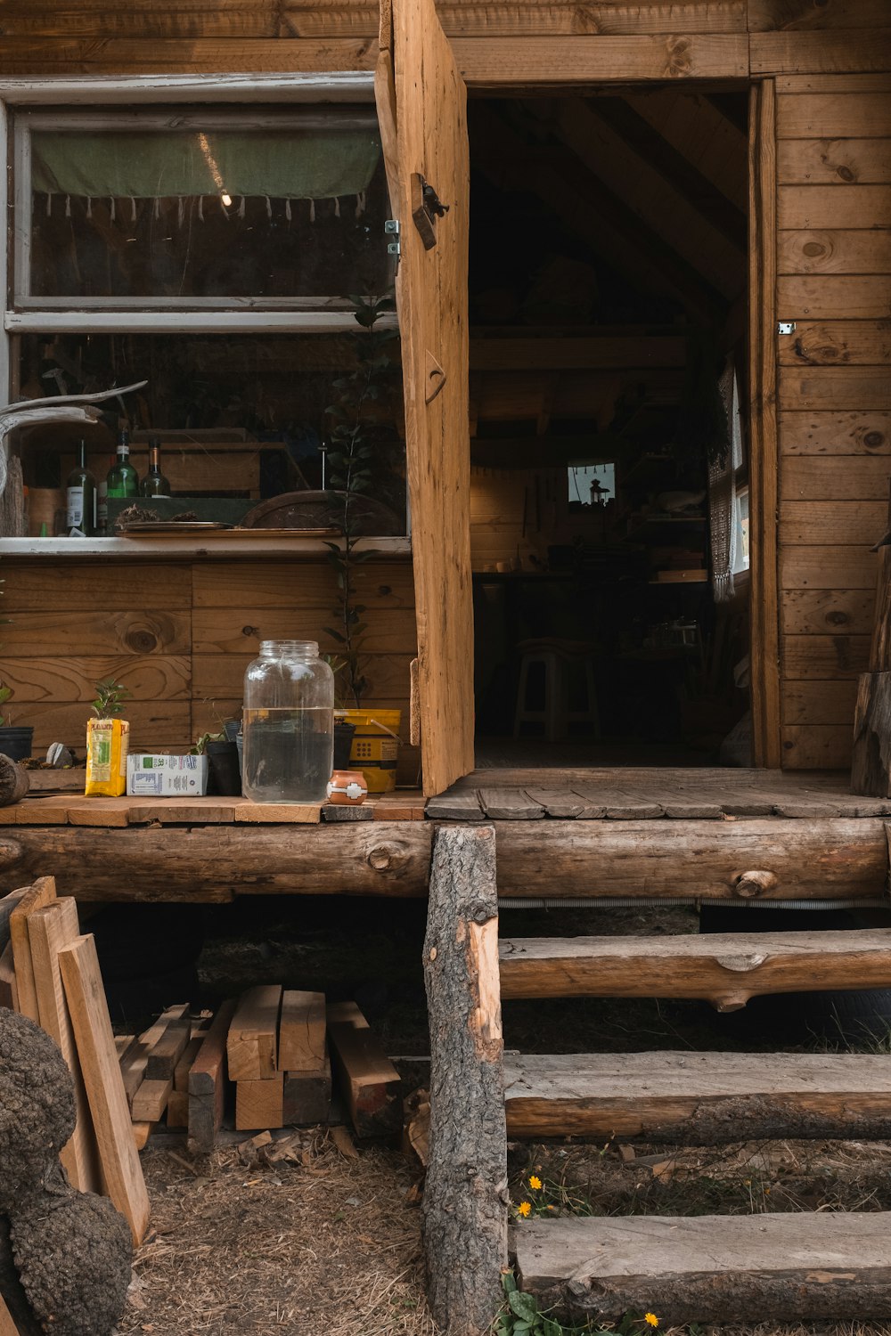 brown wooden bench near brown wooden door