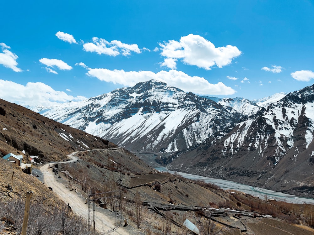 snow covered mountain under blue sky during daytime