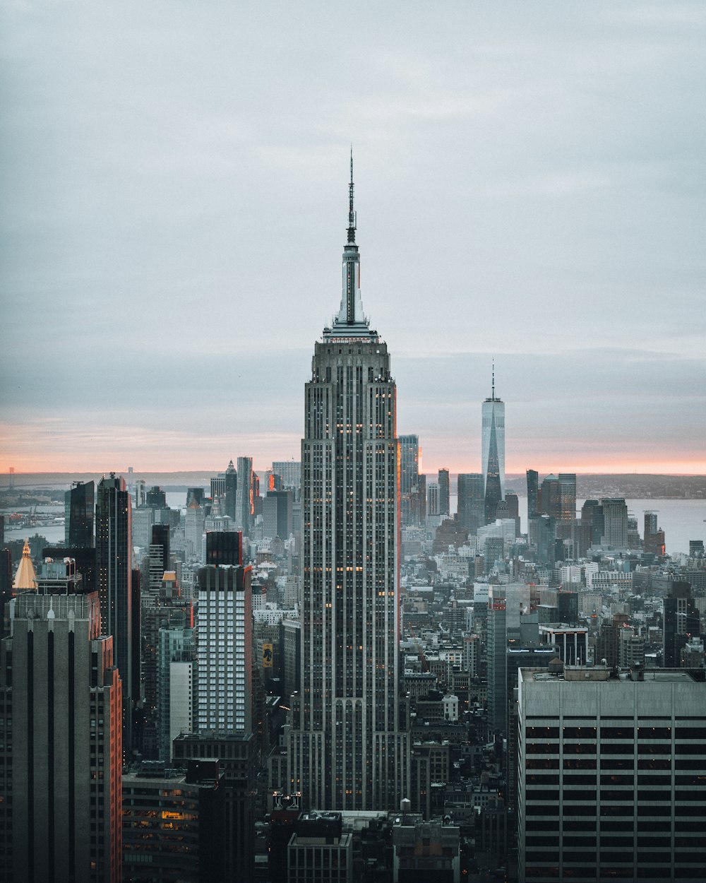 city skyline under orange sky