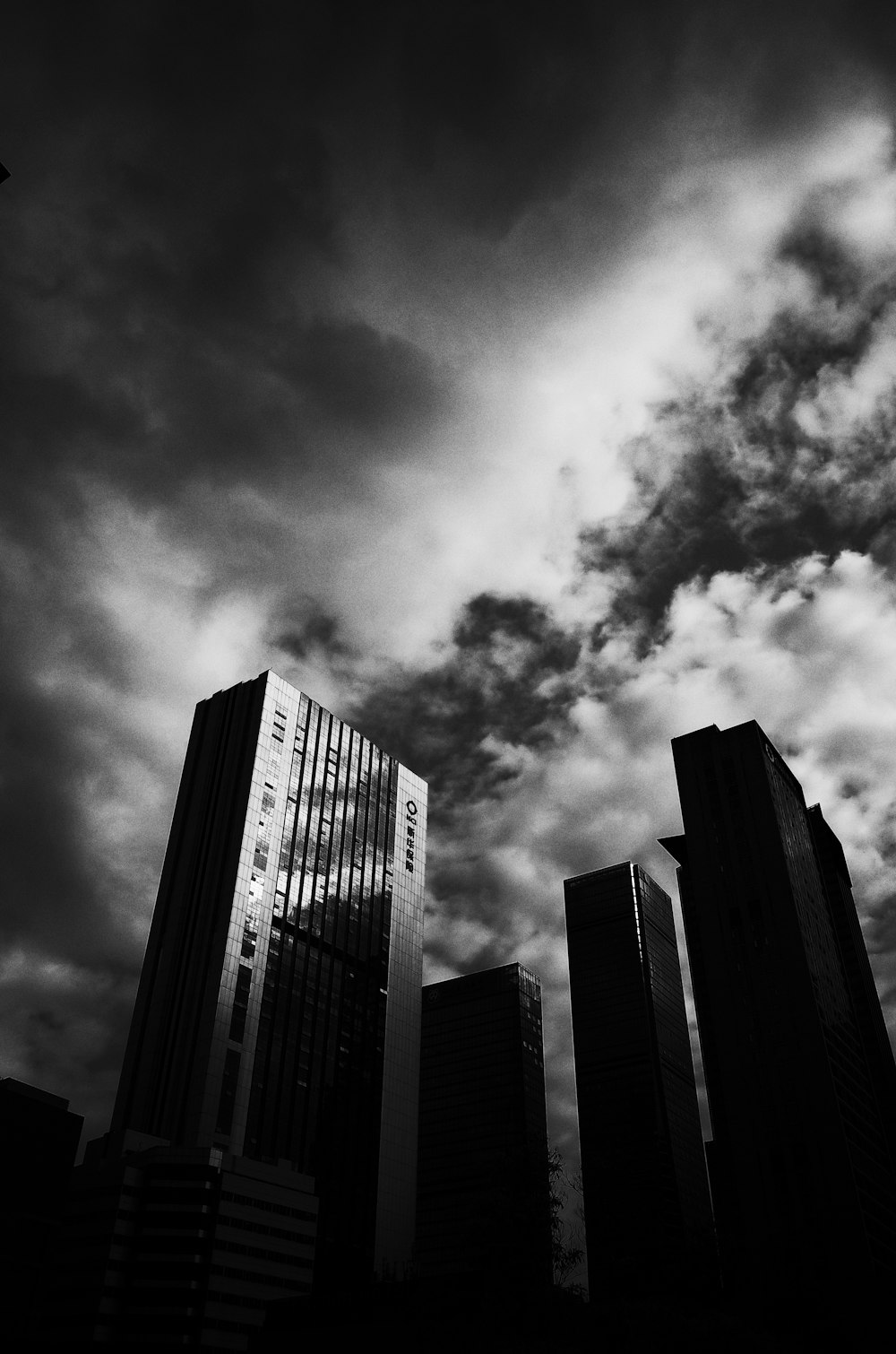 grayscale photo of high rise building