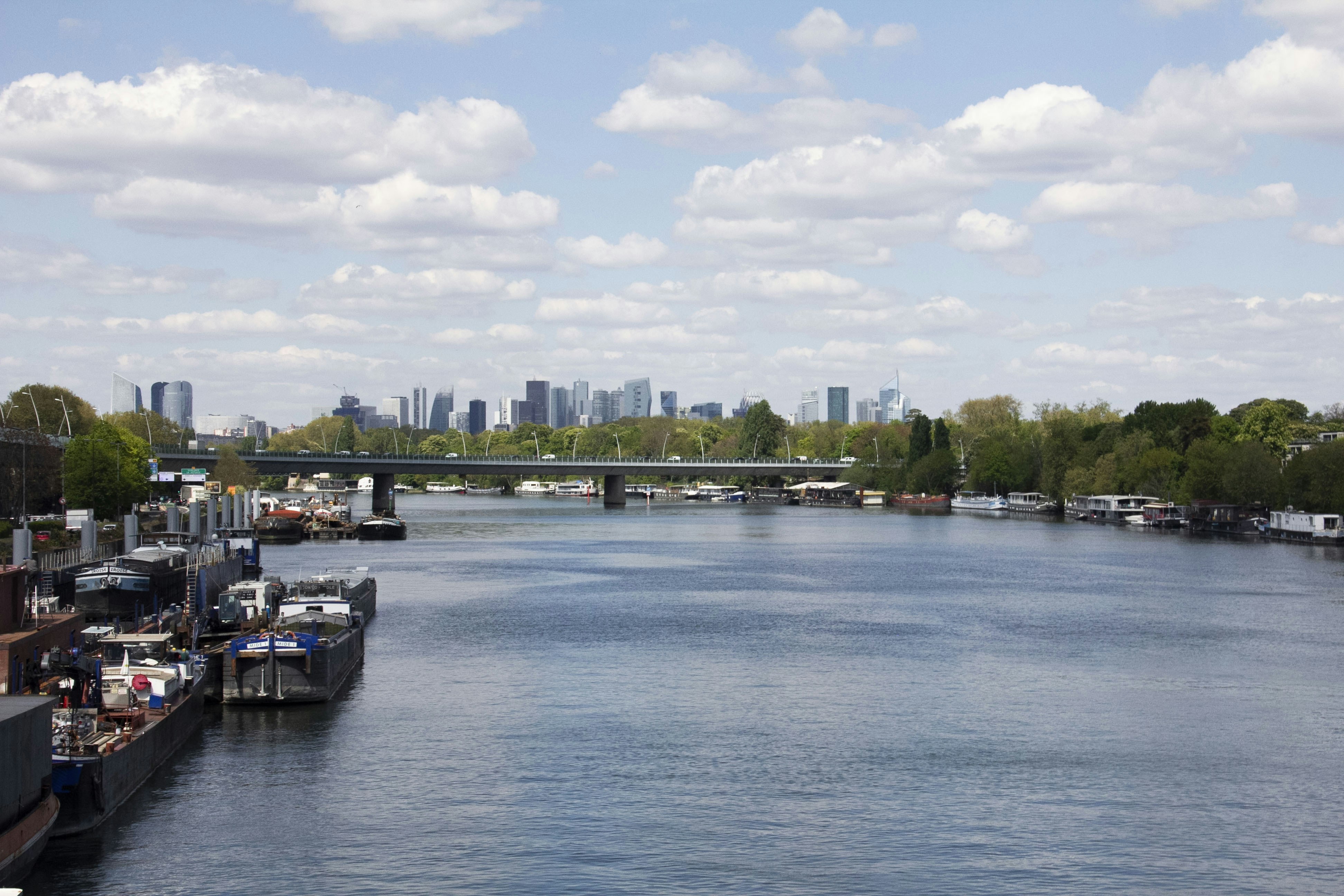 blue and white boat on water during daytime