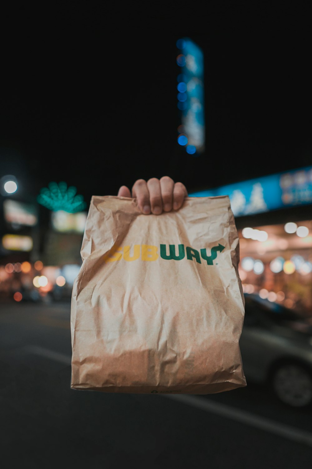 brown and green paper bag