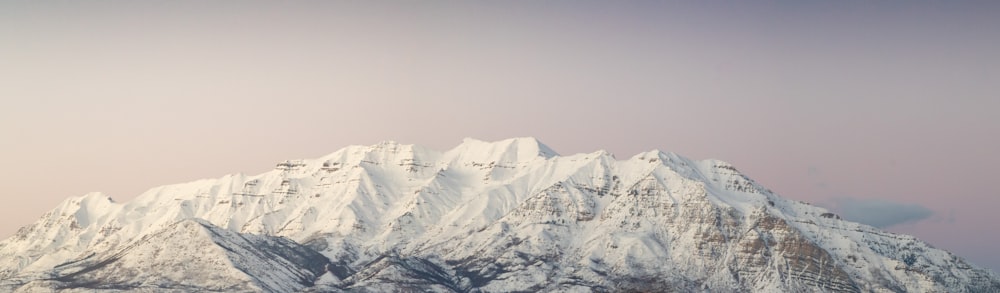 snow covered mountain during daytime