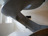 Architectural detail of a sleek staircase inside a residential project.