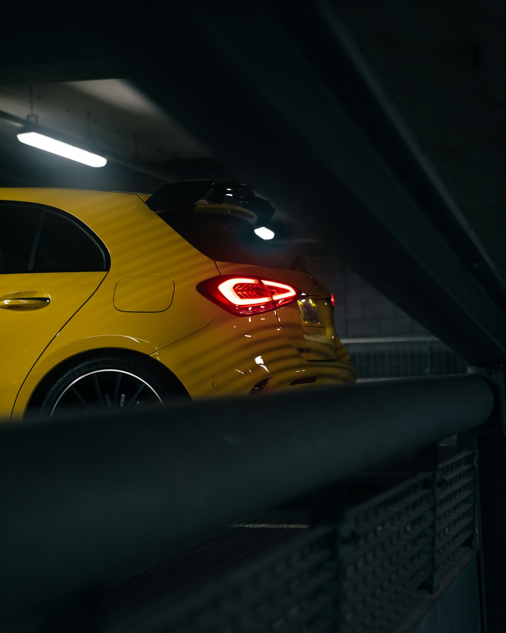 yellow car in a garage