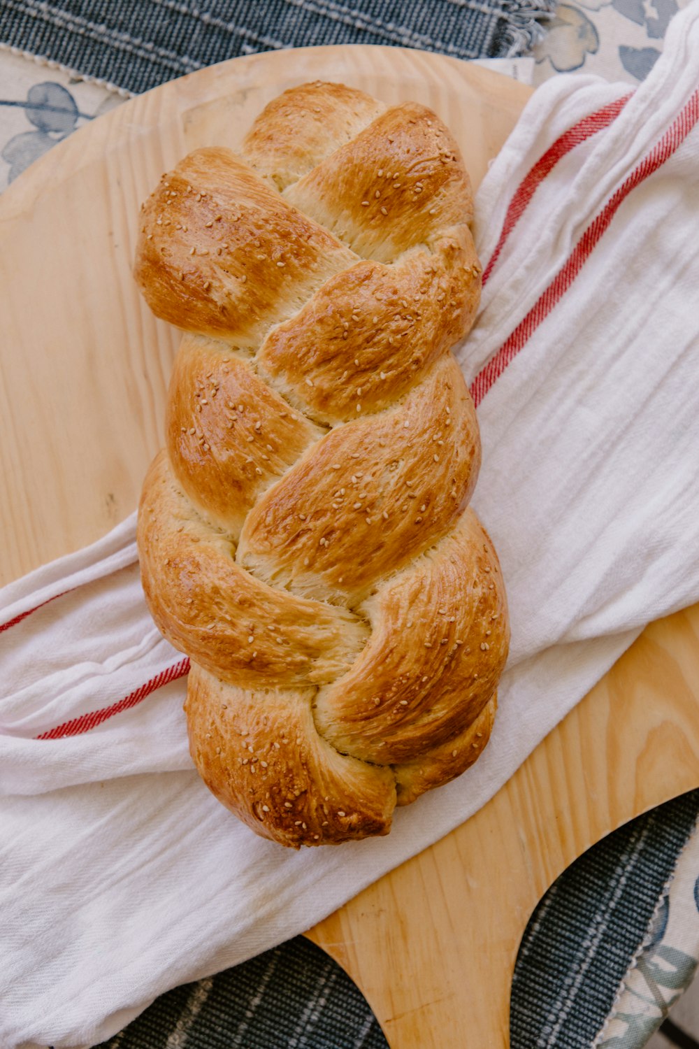 brown bread on white and red textile