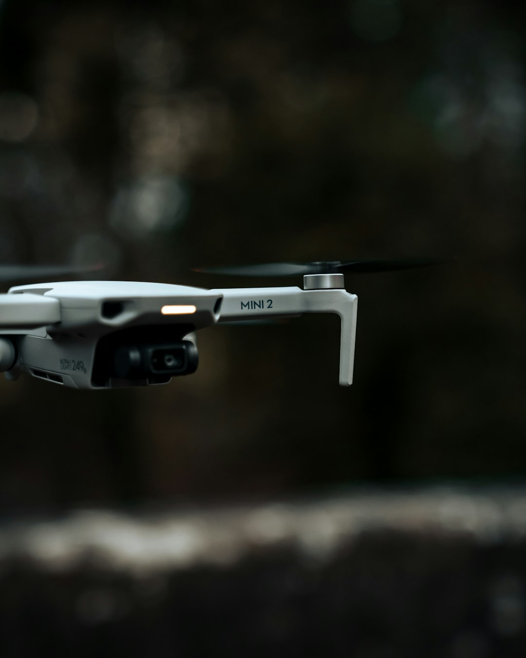 white and black drone in close up photography