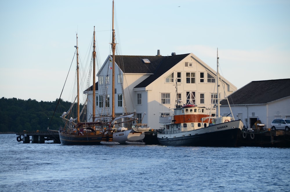 white and brown boat on sea during daytime