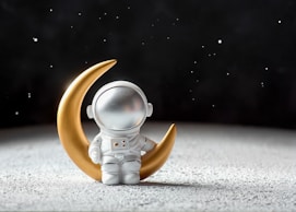 white and brown robot toy